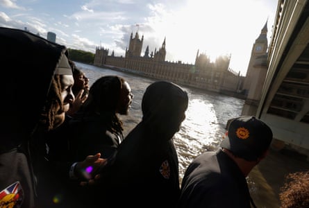 Arizona players on the Thames boat, backed the Houses of Parliament.