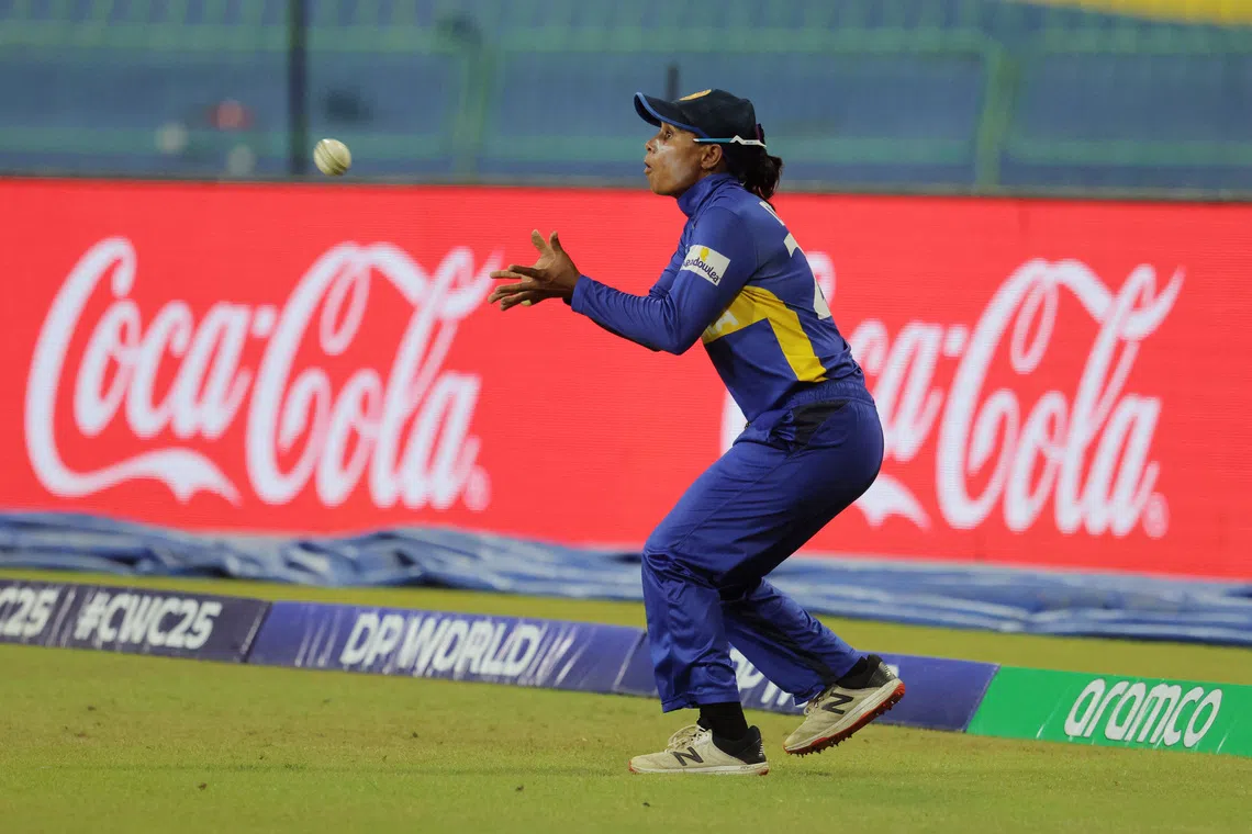 FILE PHOTO: Cricket - ICC Women's World Cup - Sri Lanka v England - R. Premadasa International Cricket Stadium, Colombo, Sri Lanka - October 11, 2025 Sri Lanka's Nilakshika Silva takes a catch to dismiss England's Nat Sciver-Brunt off the bowling of Sri Lanka's Udeshika Prabodhani REUTERS/Lahiru Harshana/File Photo
