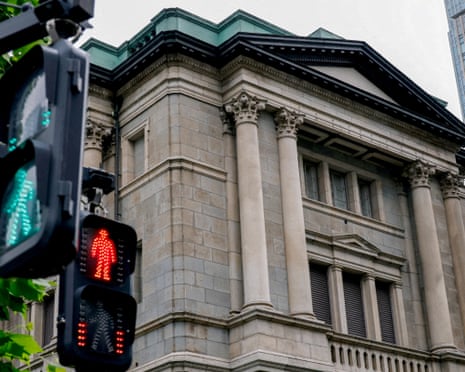 Traffic signs in front of the Bank of Japan building in Tokyo
