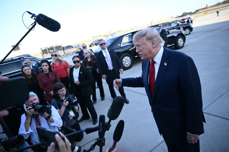 US President Donald Trump speaks to the press upon arrival at Charlotte Douglas International Airport in Charlotte, North Carolina, on September 16, 2026.