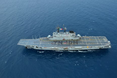 Aerial view of former Italian carrier ITS Giuseppe Garibaldi sailing across open ocean water