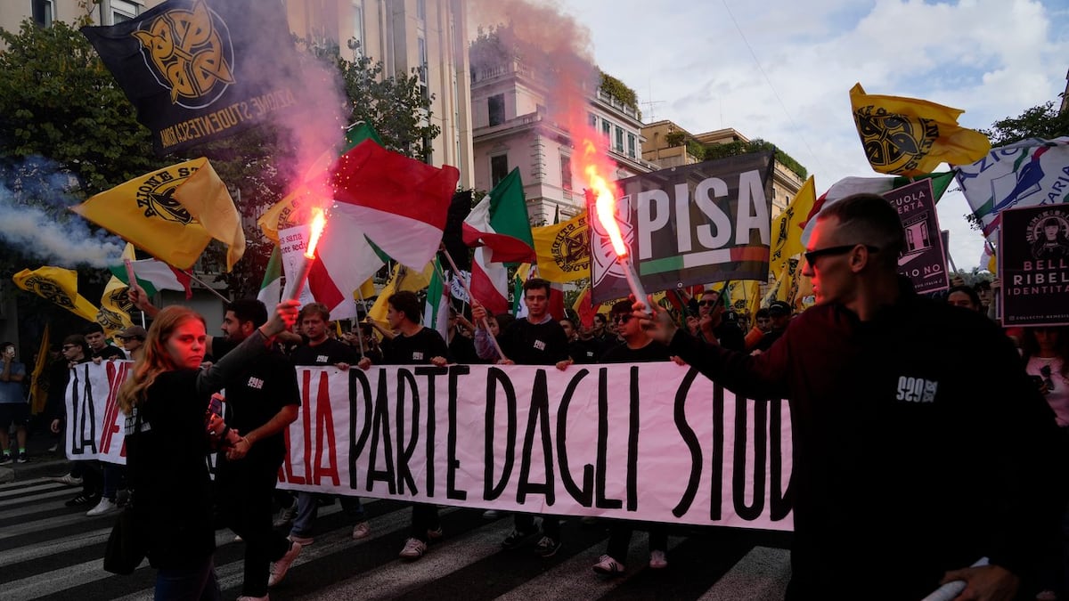 Soldiers guard centre of Milan as thousands of protesters march in cities across Europe