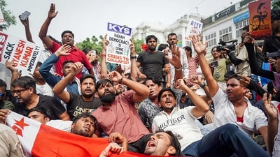 Protesters during the protest against Chief Election Commissioner Gyanesh Kumar at Palika Bazar, Connaught Place, in New Delhi on Sunday. (ANI Photo/ Ritik Sharma)