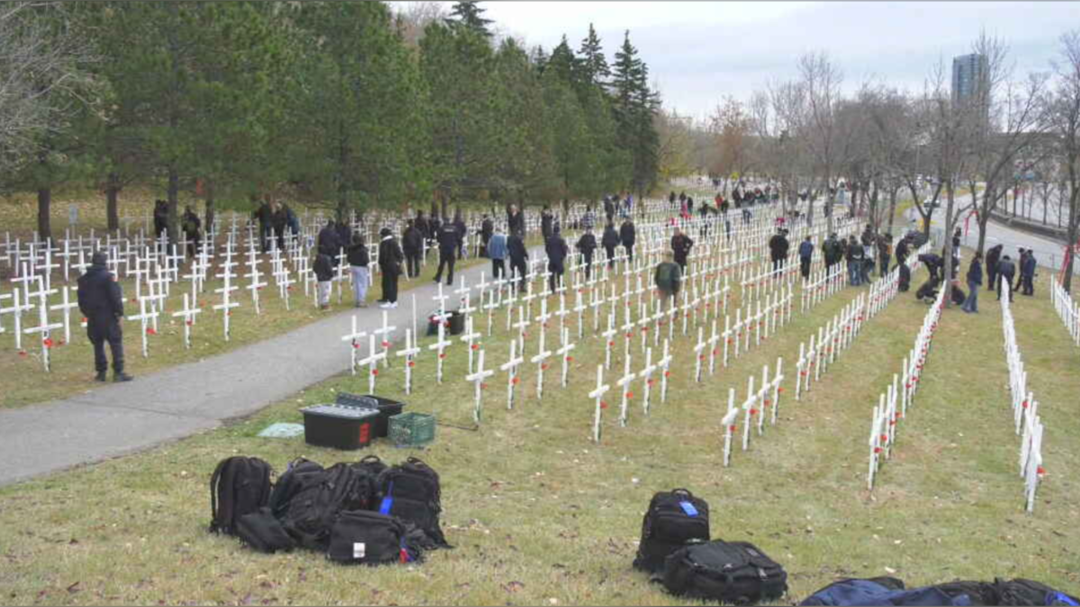 Volunteers installed more than 3,700 crosses at the Field of Crosses along Memorial Drive NW