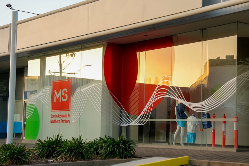 A glass building bearing the red logo which reads MS South Australia and Northern Territory