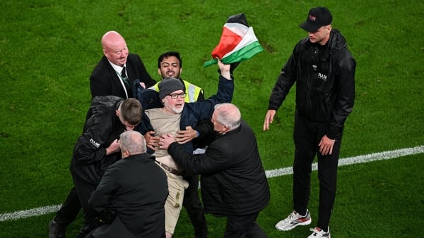 1 October 2026; A protestor is removed from the pitch during during the UEFA Nations League B match between the Republic of Ireland and Austria at the Aviva Stadium in Dublin. Photo by Sam Barnes/Sportsfile